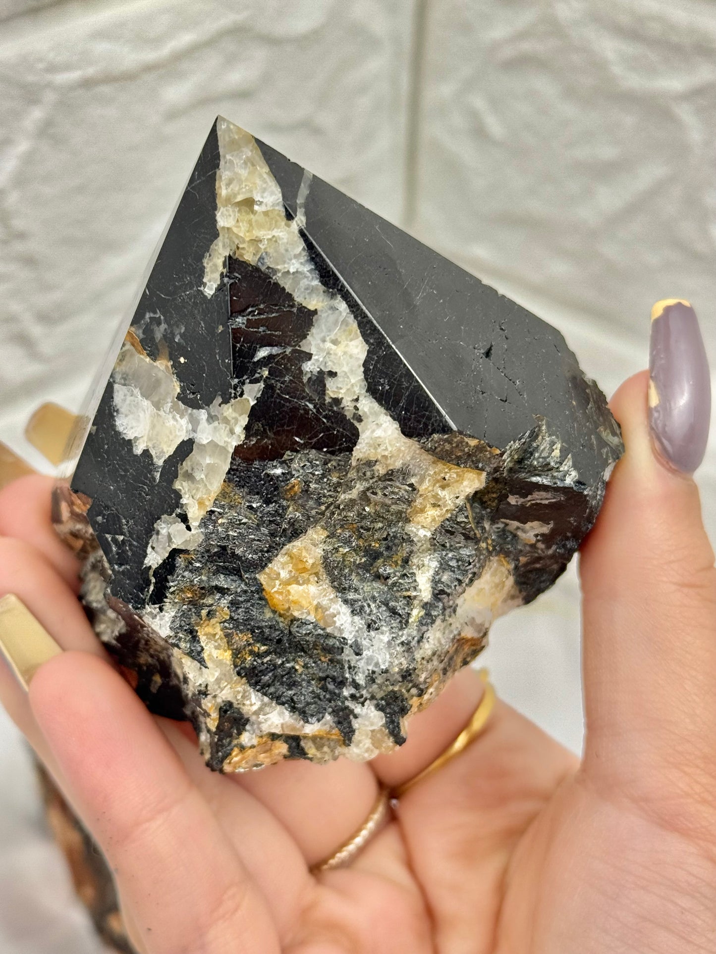 1 black tourmaline, mica, and quartz top polished point from Brazil