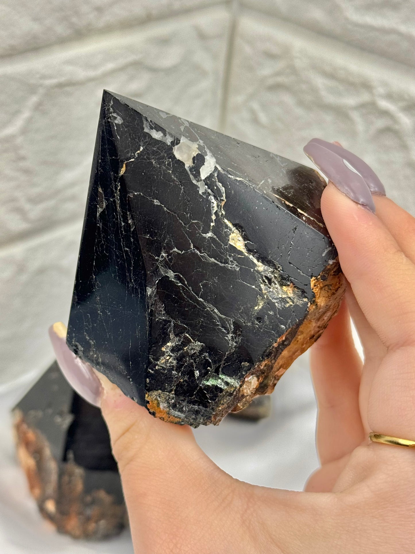 1 black tourmaline, mica, and quartz top polished point from Brazil