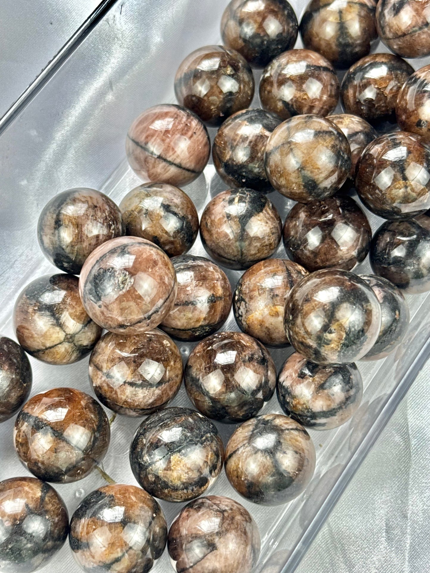1 intuitive Chiastolite mini sphere