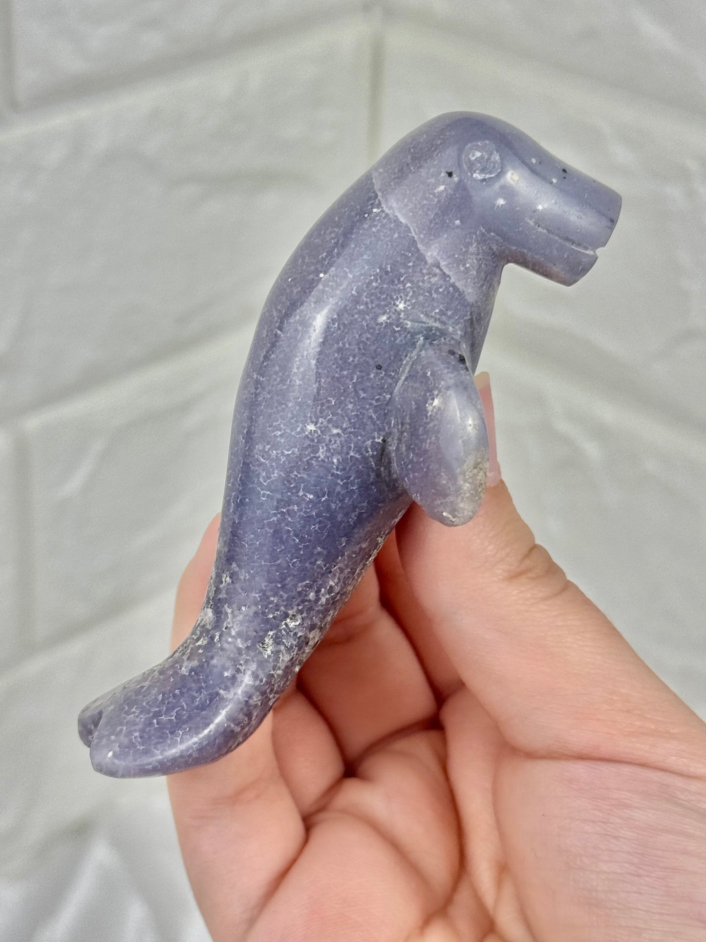 1 adorable purple chalcedony manatee