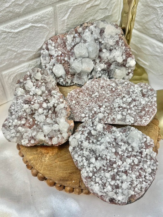 You pick! Red apophyllite specimens from India