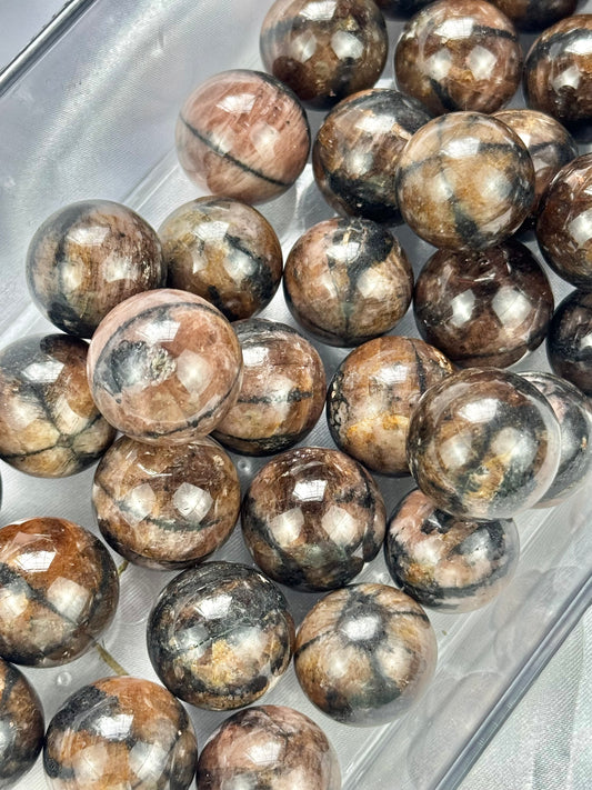 1 intuitive Chiastolite mini sphere