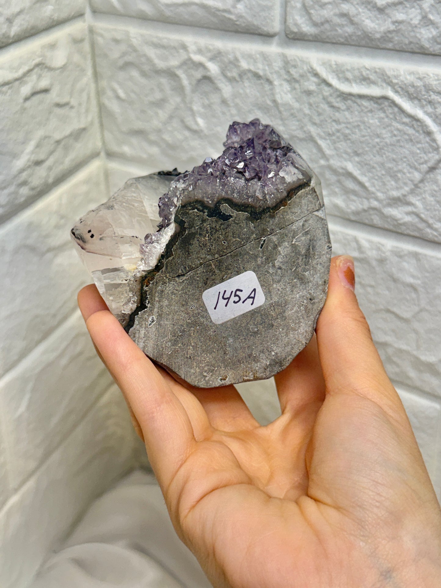 Insane purple Uruguay amethyst with calcite and goethite A