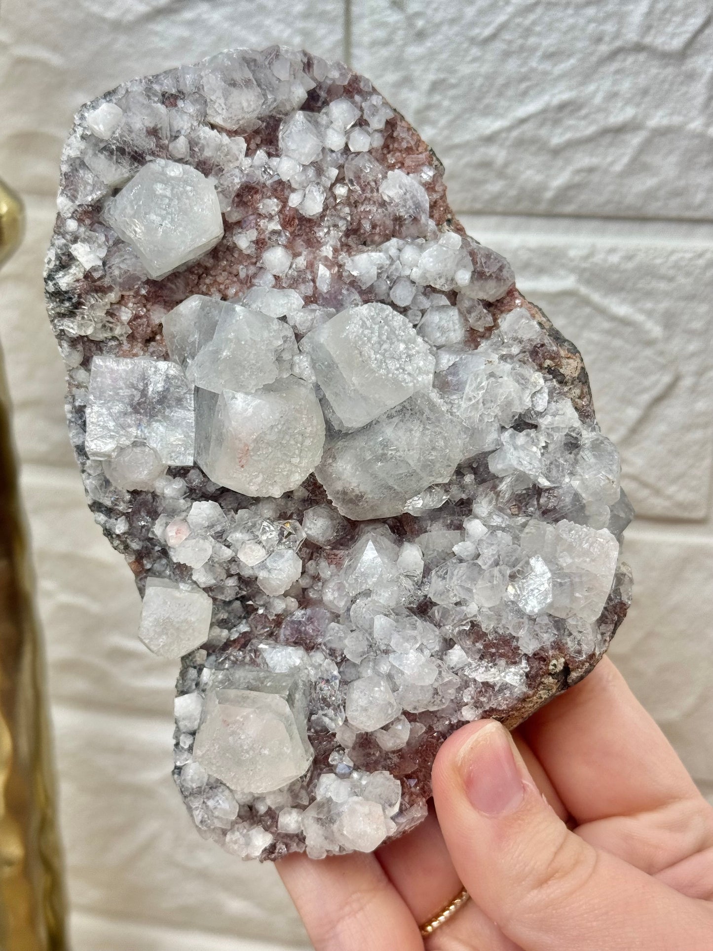 You pick! Red apophyllite specimens from India