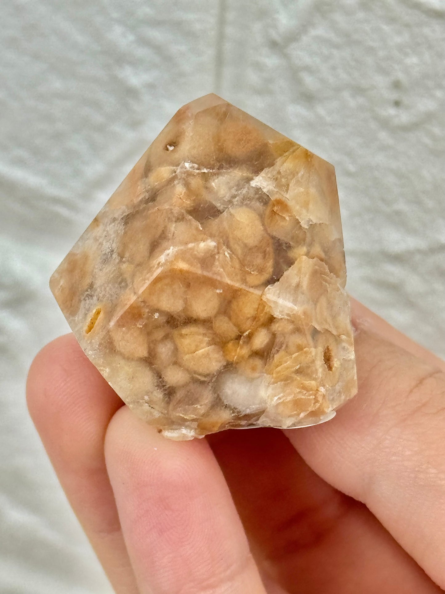 You pick! Unique orange amphibole in quartz from Brazil