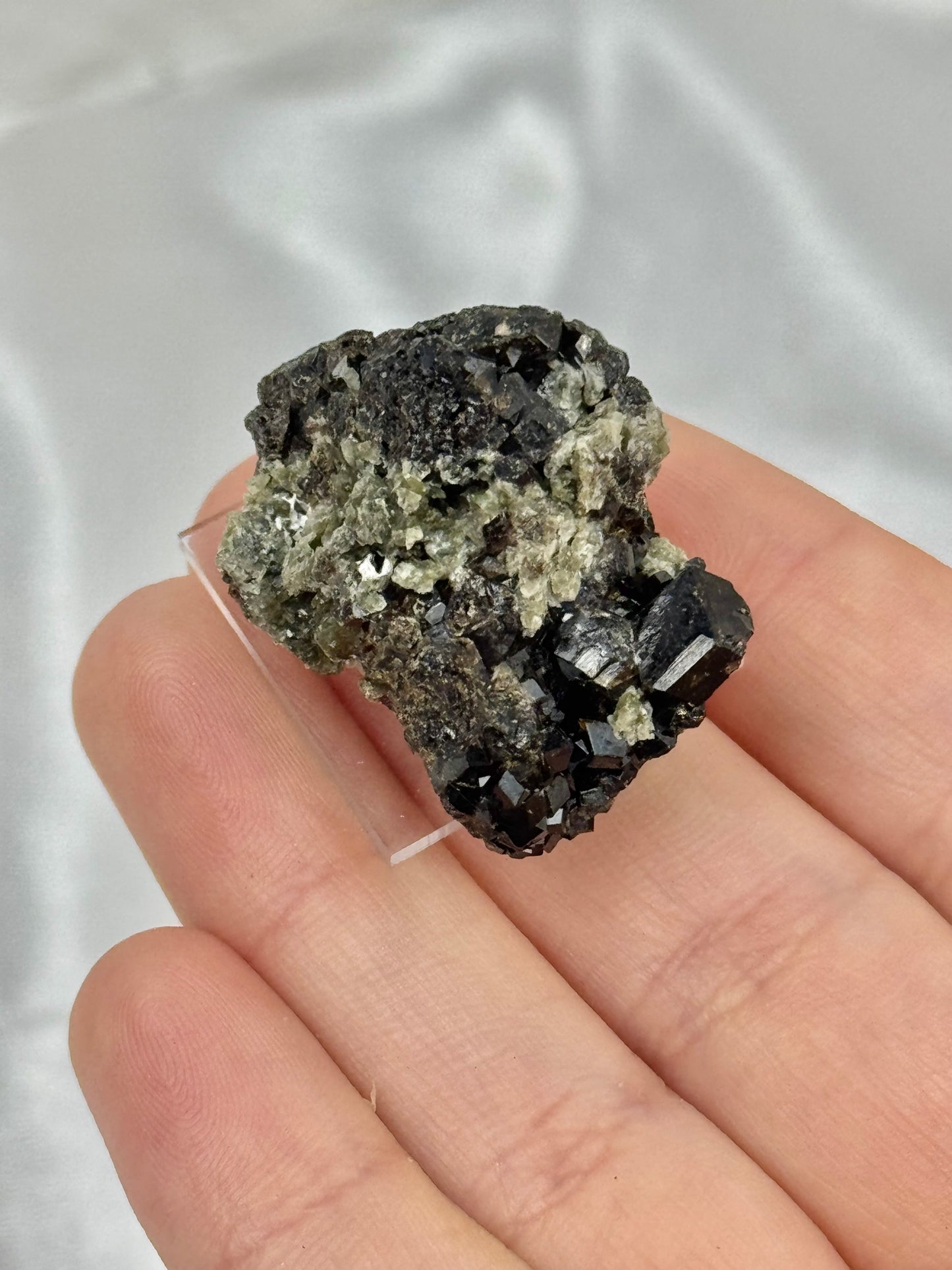 1 black garnet on stand from Mexico