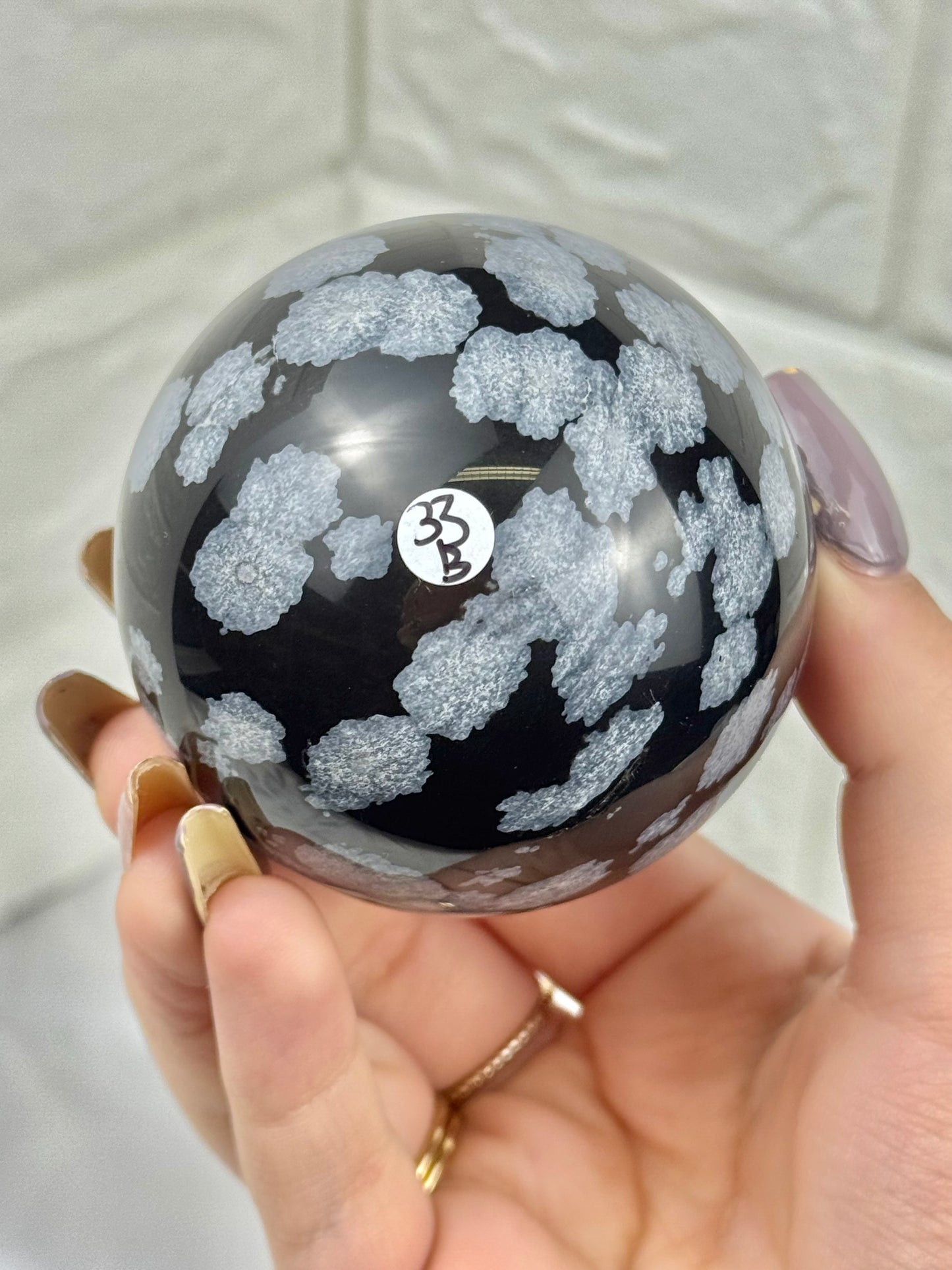 Snowflake obsidian sphere