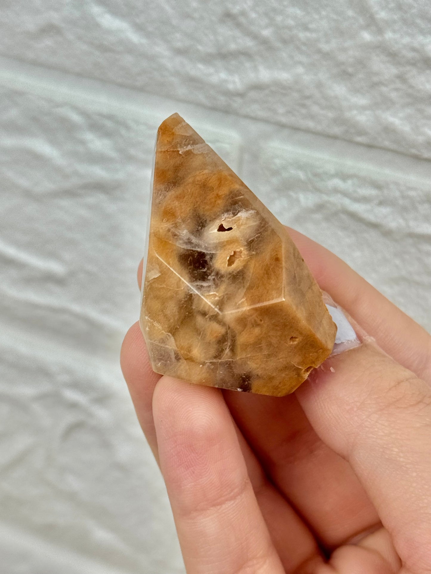You pick! Unique orange amphibole in quartz from Brazil