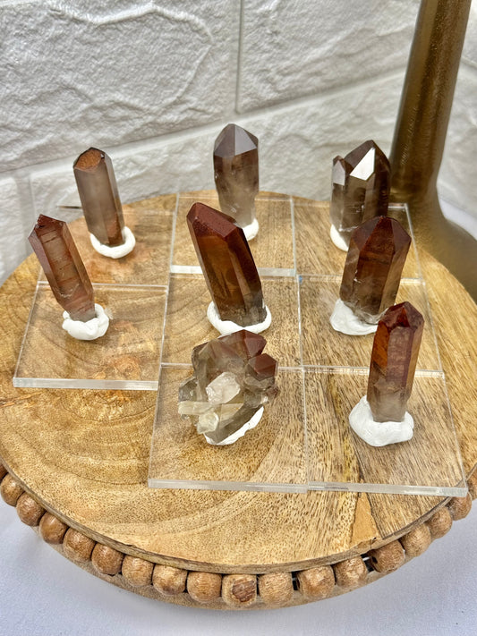 You pick! Hematite included smoky quartz points on stands from Orange river Namibia