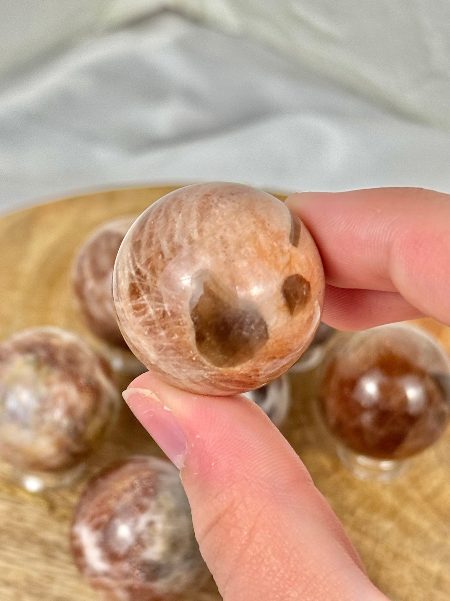 1 flashy sunstone x moonstone sphere from Tanzania
