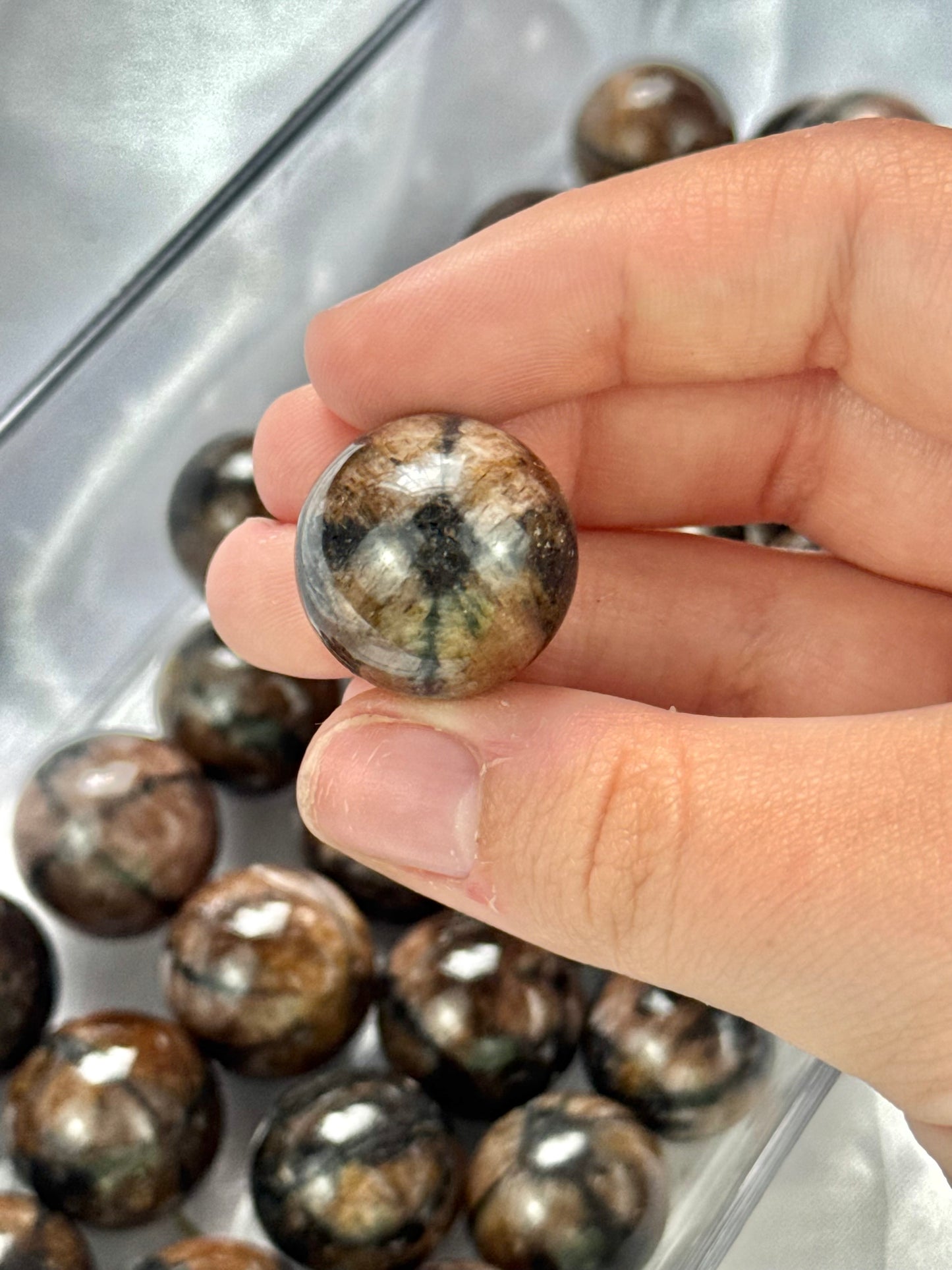 1 intuitive Chiastolite mini sphere