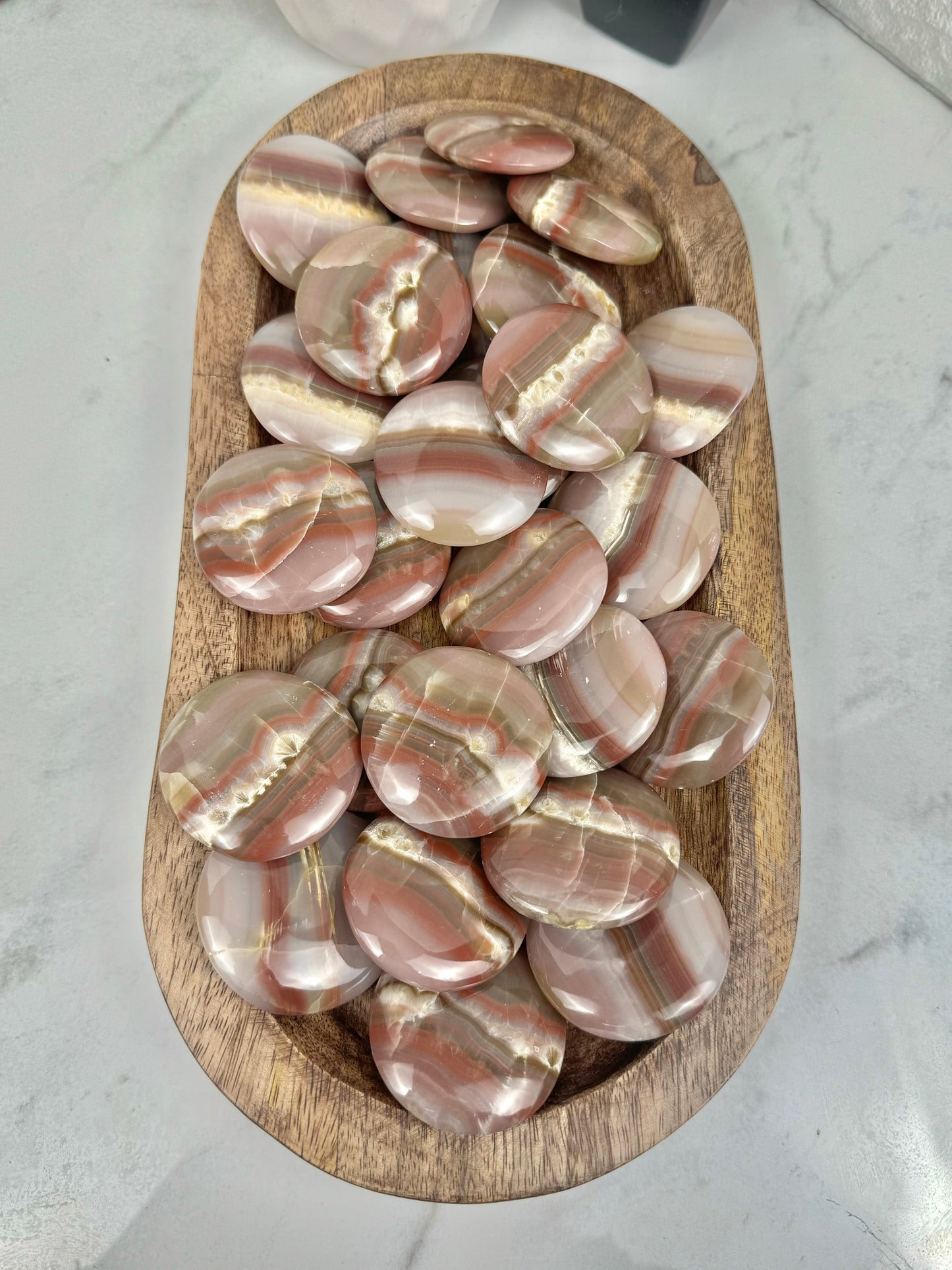 1 pink banded calcite “cookie” flat stone