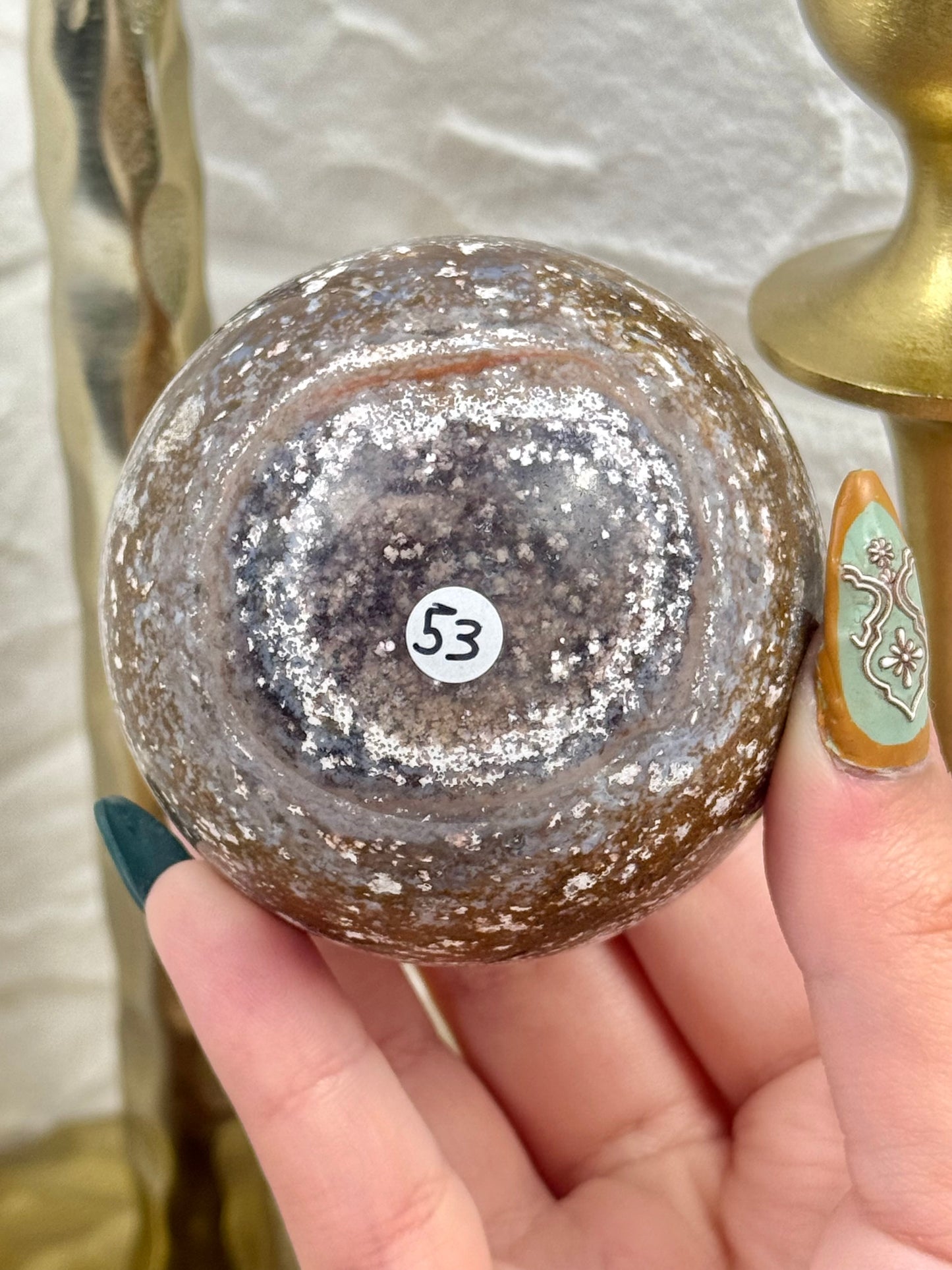 Purple/brown sea jasper sphere