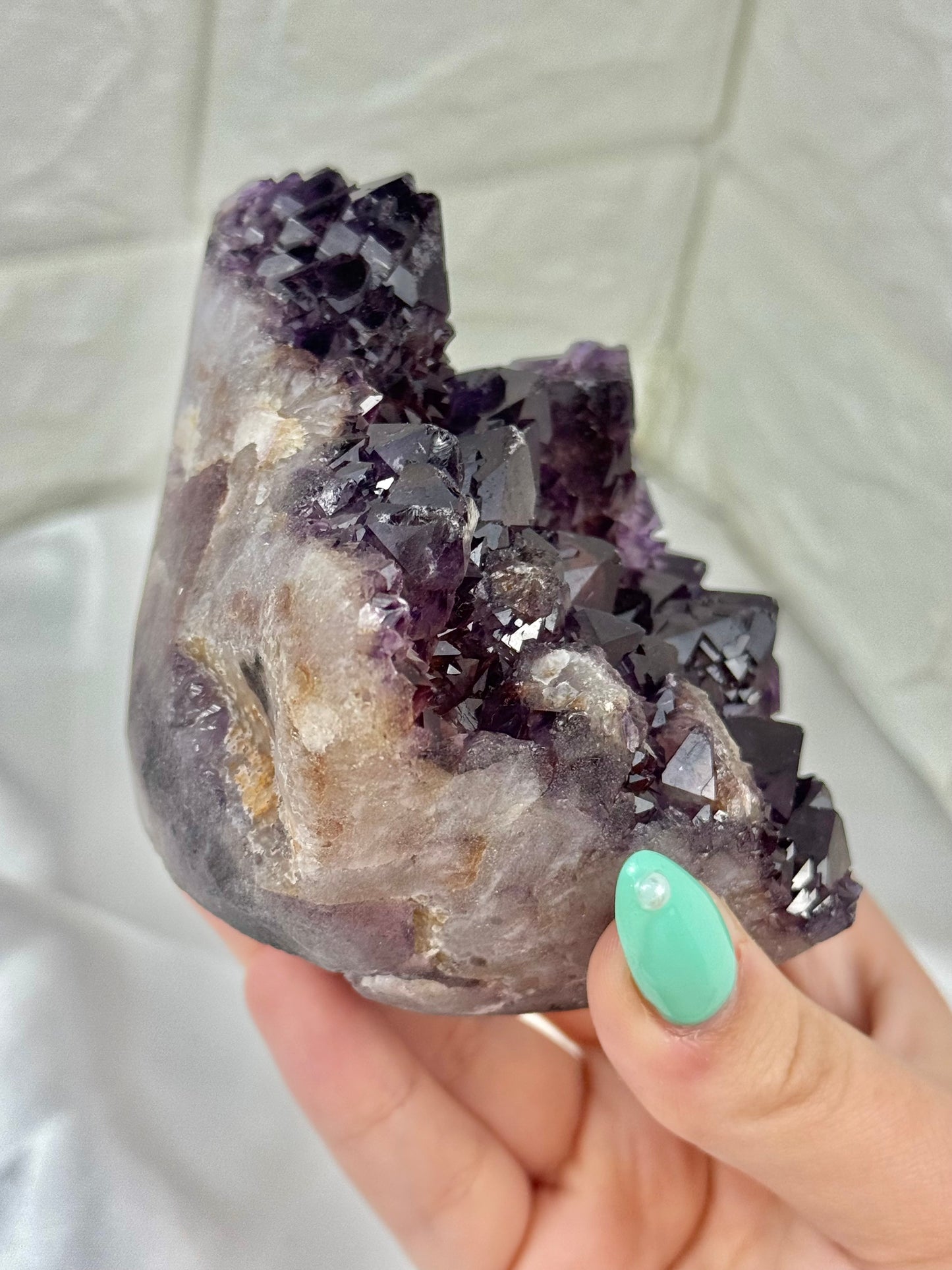 Beautiful elestial amethyst with hematite from India