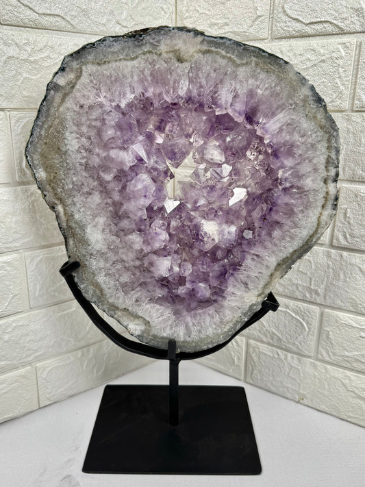 XXL purple amethyst slab on stand from Brazil