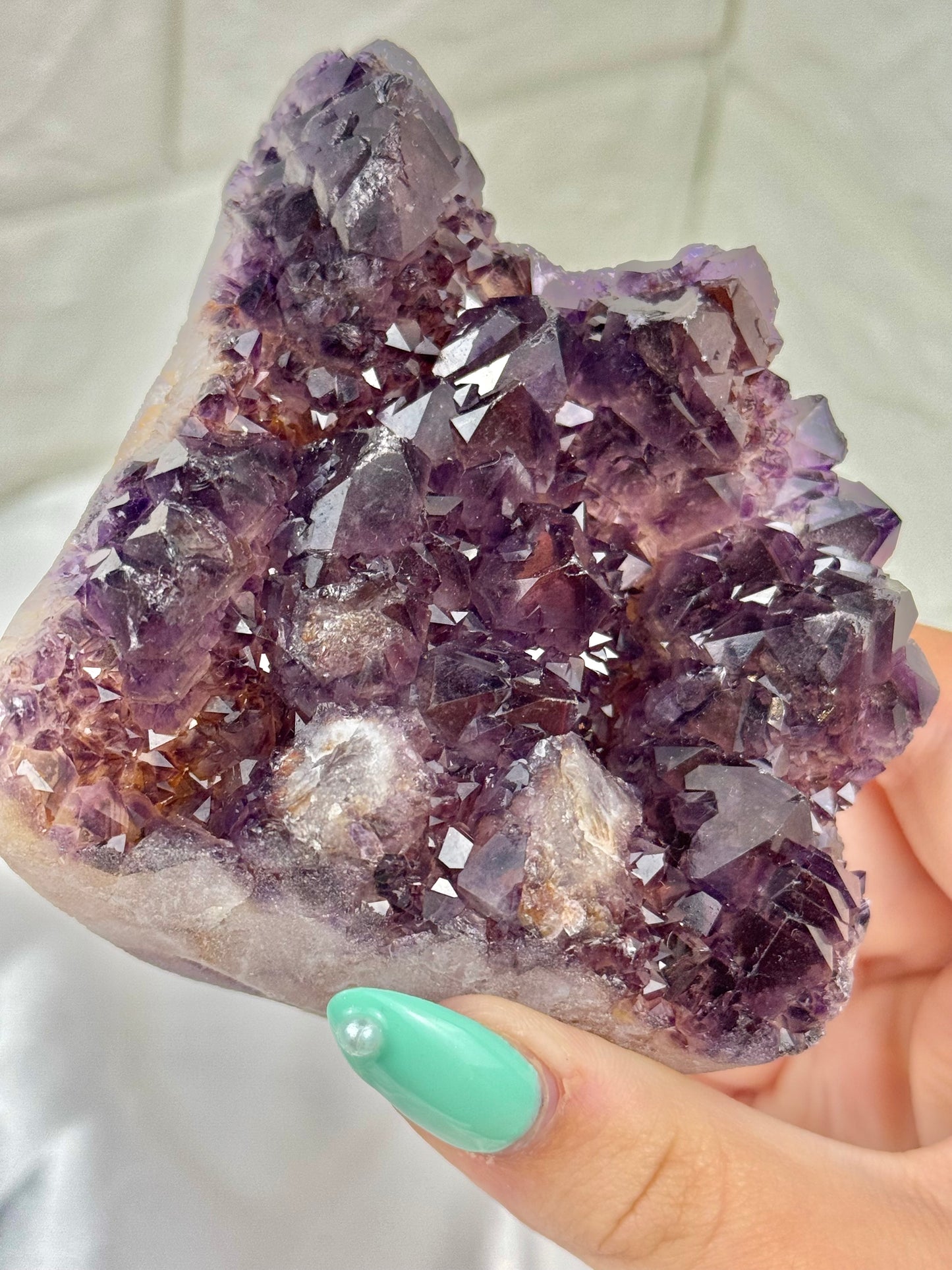 Beautiful elestial amethyst with hematite from India