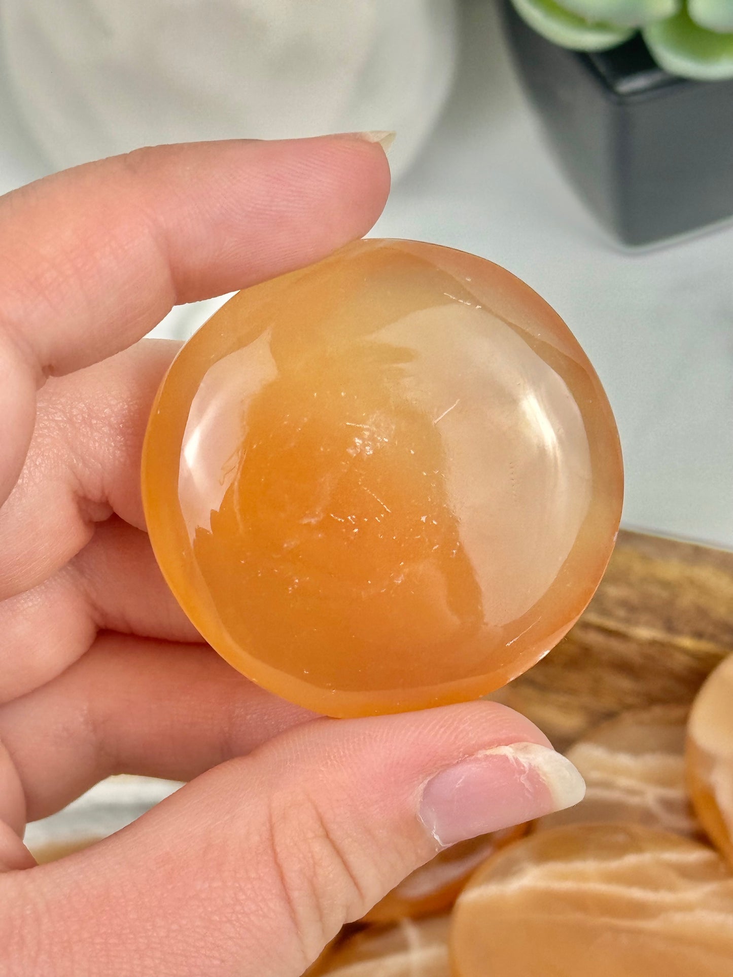 1 honey calcite “cookie” flat stone