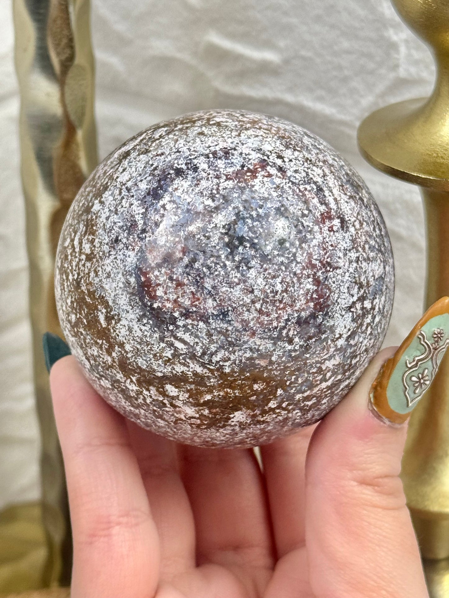 Purple/brown sea jasper sphere