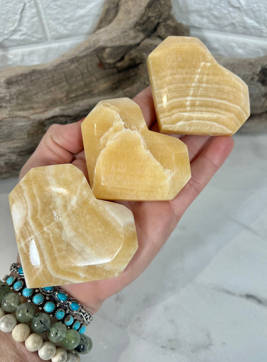 1 orange calcite faceted heart