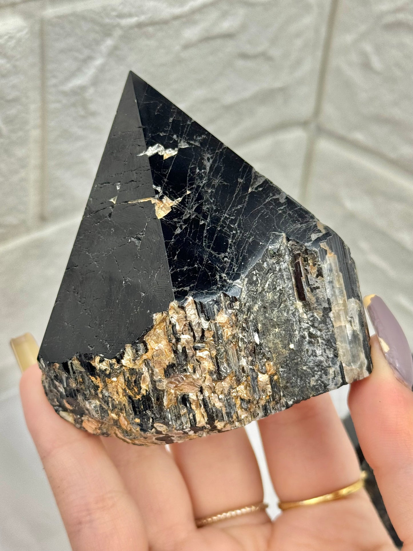 1 black tourmaline, mica, and quartz top polished point from Brazil