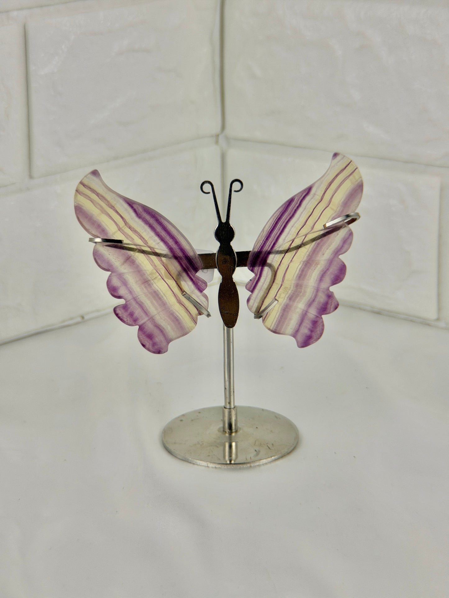 1 intuitive fluorite butterfly on silver stand