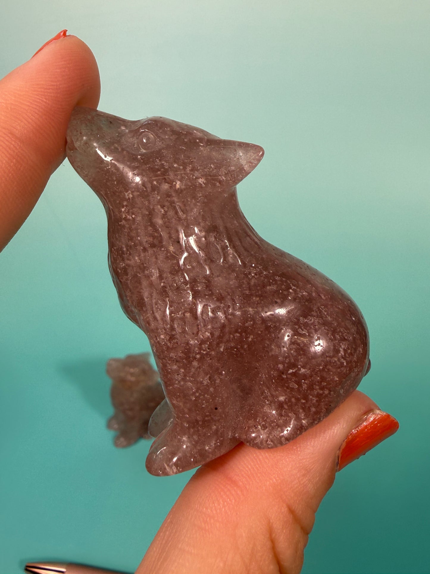 1 strawberry quartz wolf carving