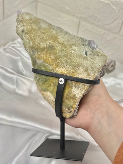 Stunning green amethyst crust on stand from Brazil