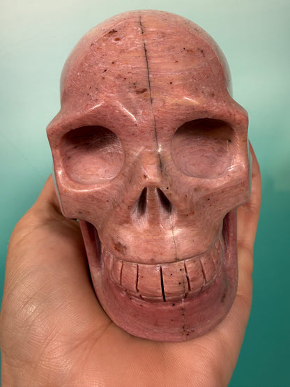 Amazing deep pink rhodonite skull