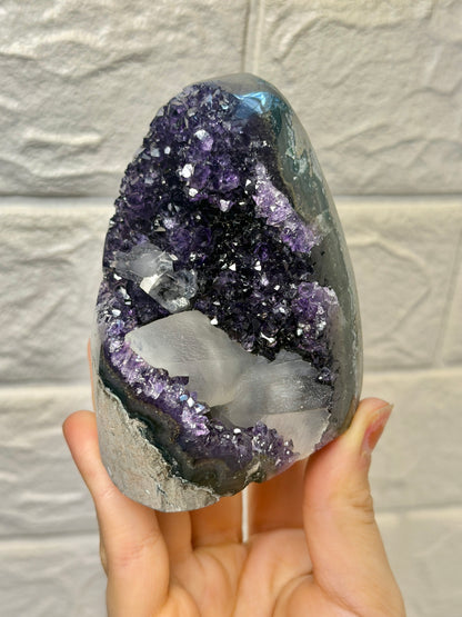 Juicy purple Uruguay amethyst with calcite F