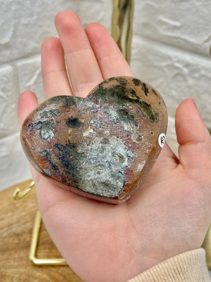 Beautiful lavender amethyst heart with hematite on gold stand from Brazil