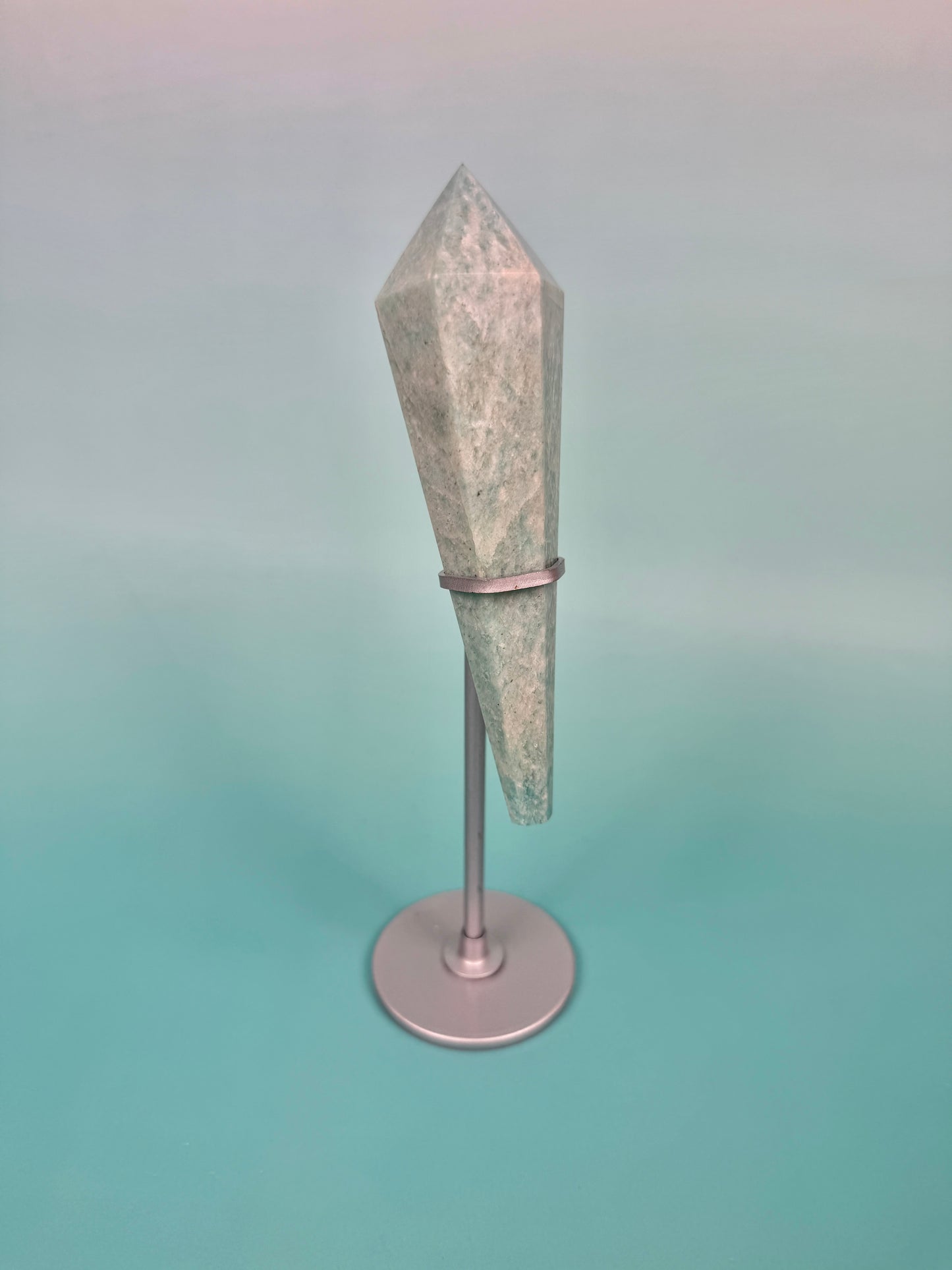 Amazonite point on silver stand