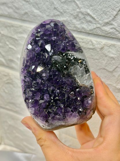 Beautiful purple Uruguay amethyst with calcite and goethite Q