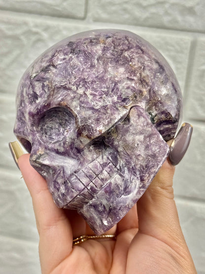 Flashy lepidolite skull