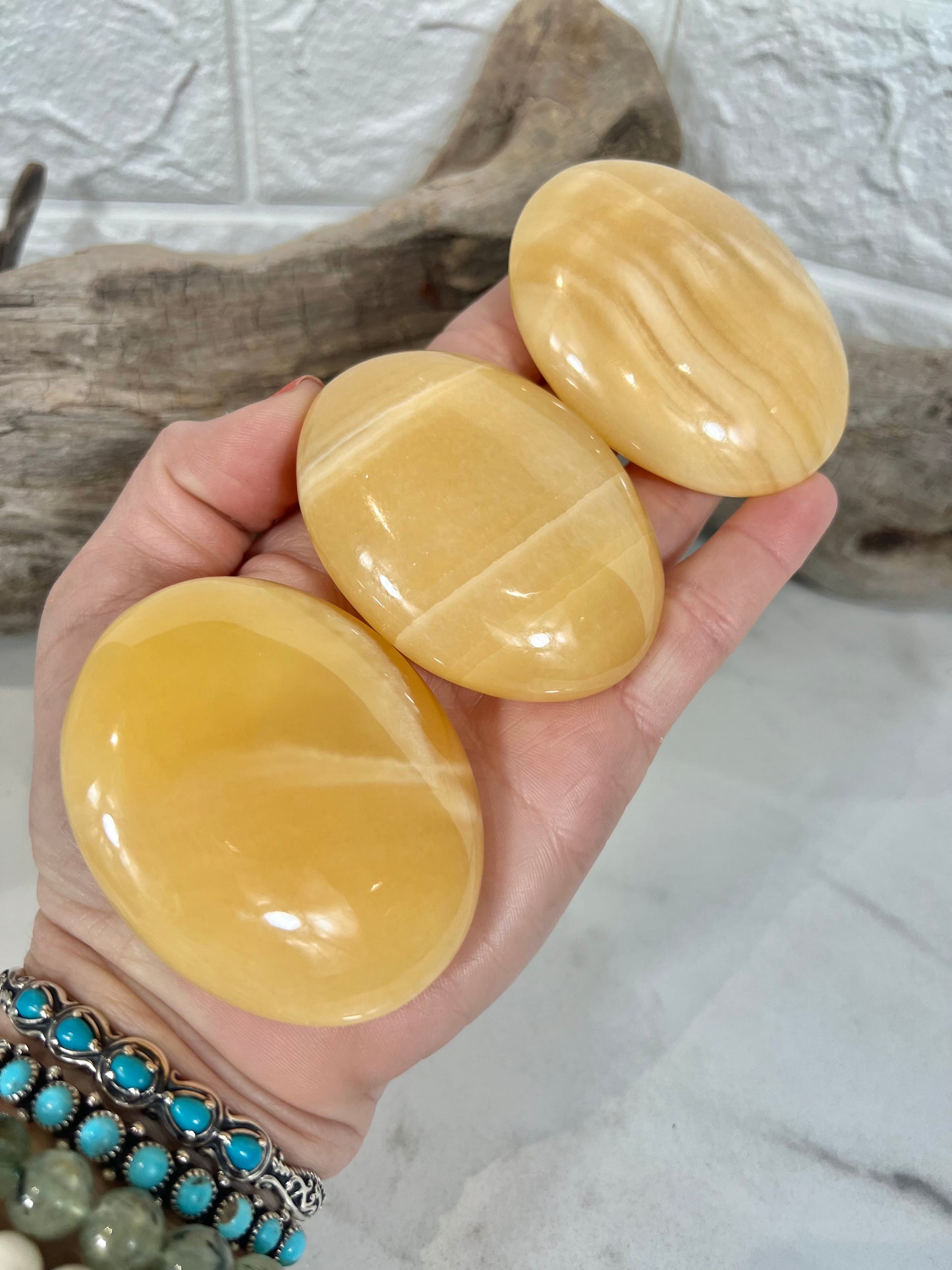 1 Orange calcite palm stone