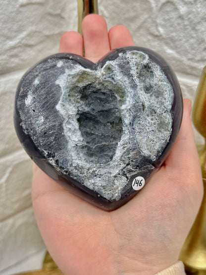 Beautiful dark green amethyst x agate heart on gold stand from Brazil