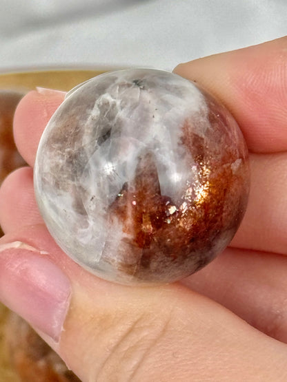 1 flashy sunstone x moonstone sphere from Tanzania
