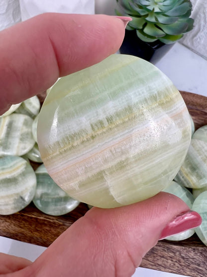 1 pistachio calcite “cookie” flat stone