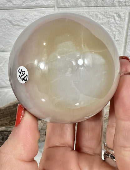 Beautiful pink banded calcite sphere A