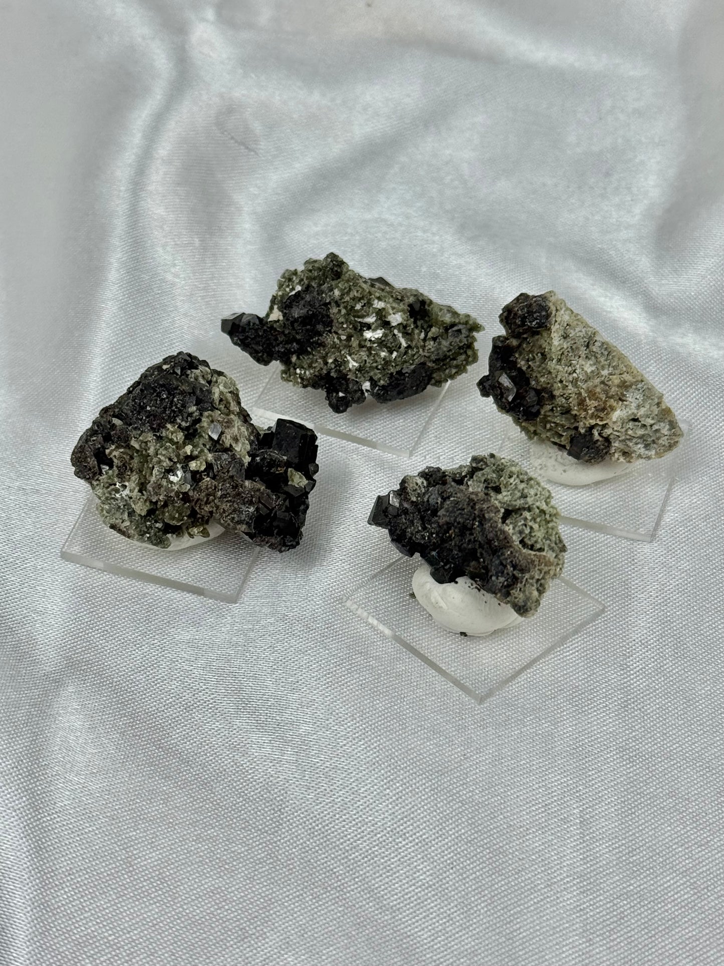 1 black garnet on stand from Mexico