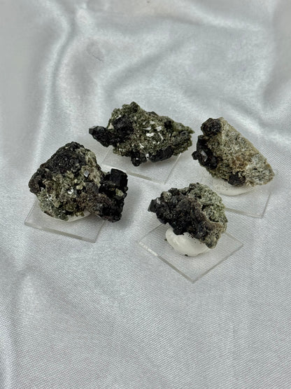 1 black garnet on stand from Mexico