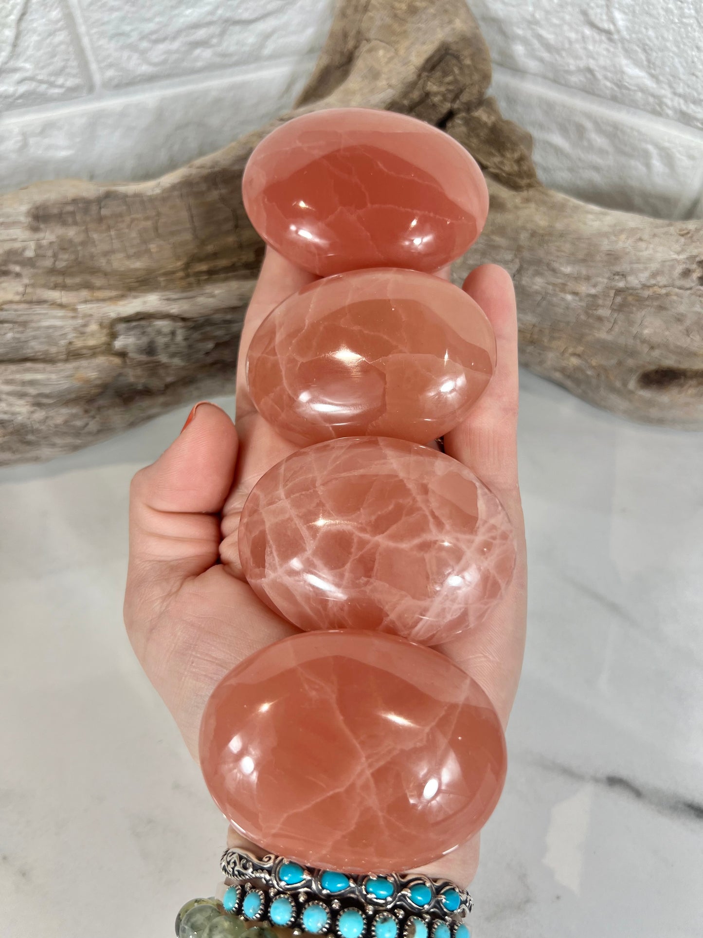 1 strawberry calcite palm stone