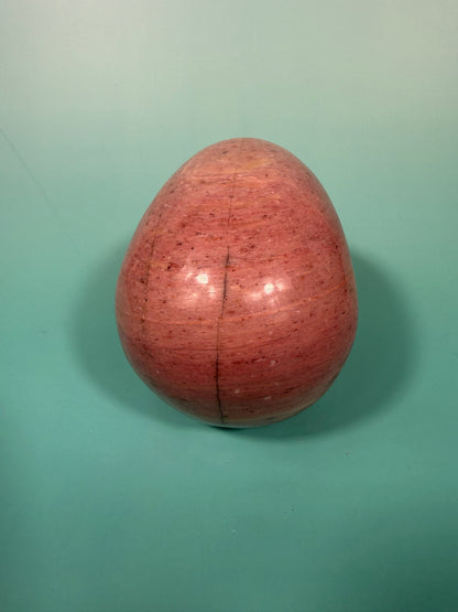 Amazing deep pink rhodonite skull