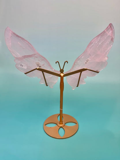 Beautiful rose quartz butterfly on gold stand