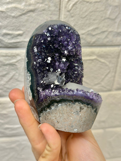 Juicy purple Uruguay amethyst with calcite F