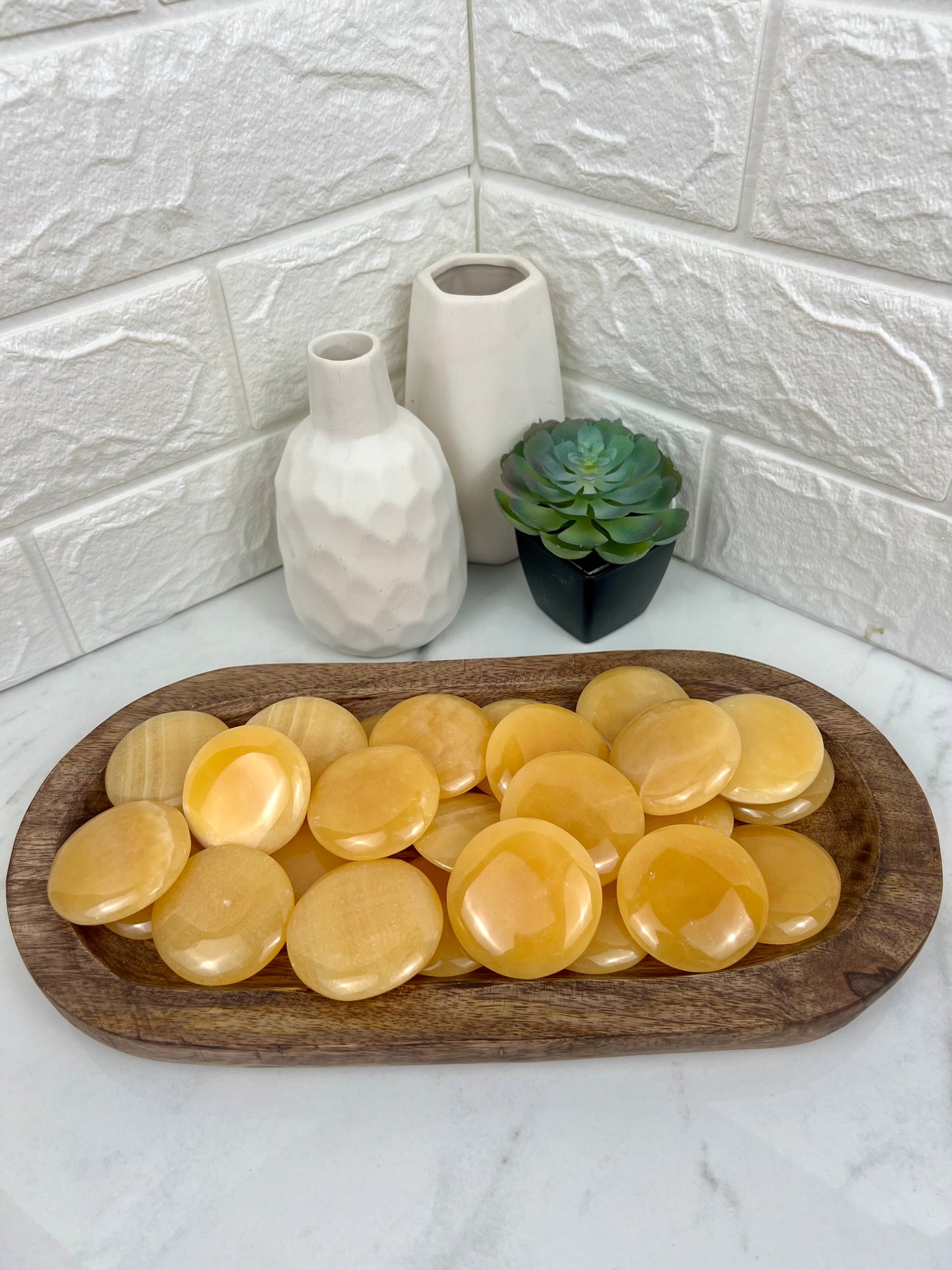 1 Orange calcite “cookie” flat stone