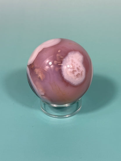 Stunning pink jelly agate sphere U (heated color)