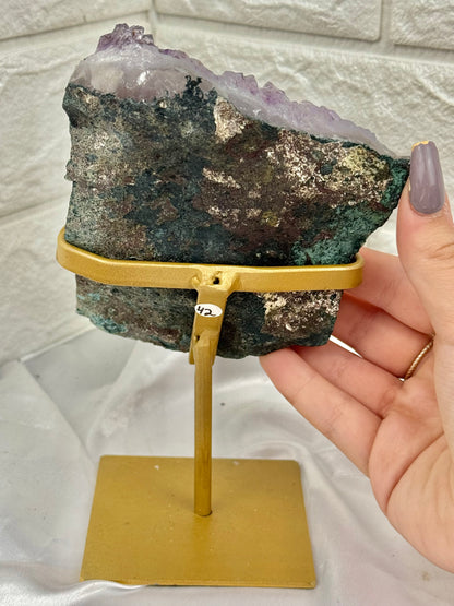 Beautiful amethyst on gold stand from Brazil
