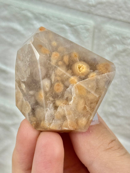 You pick! Unique orange amphibole in quartz from Brazil