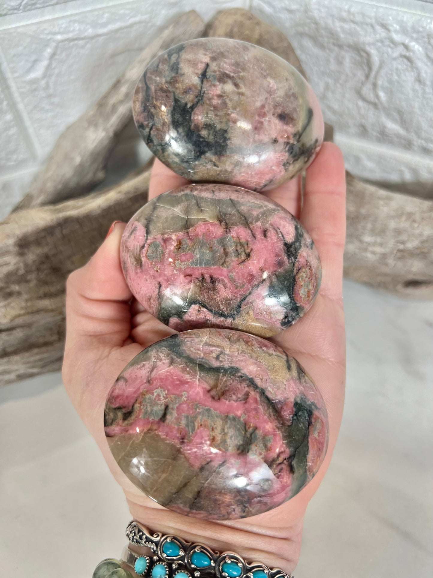 1 pink rhodonite palm stone