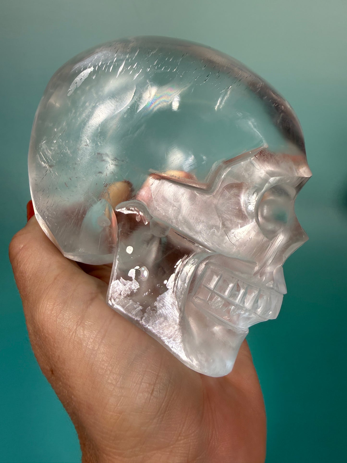 Beautiful satin spar skull carving Q